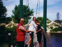 Grampa with the grandkids at The Two-Hearted River near Lk. Superior